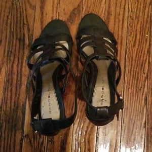 Strappy black wedge heels